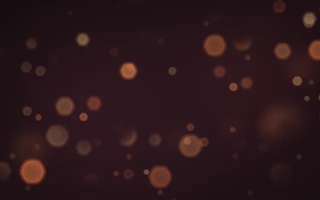 Soft hexagonal circles of amber, copper and cream light float on a deep plum background.