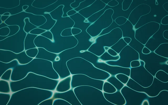 Bright, wavy lines of light form a web across a deep teal pool floor, with faint tile seams beneath.